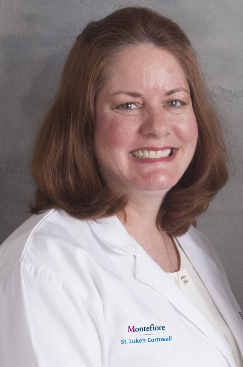 Kathy Sheehan in white lab coat